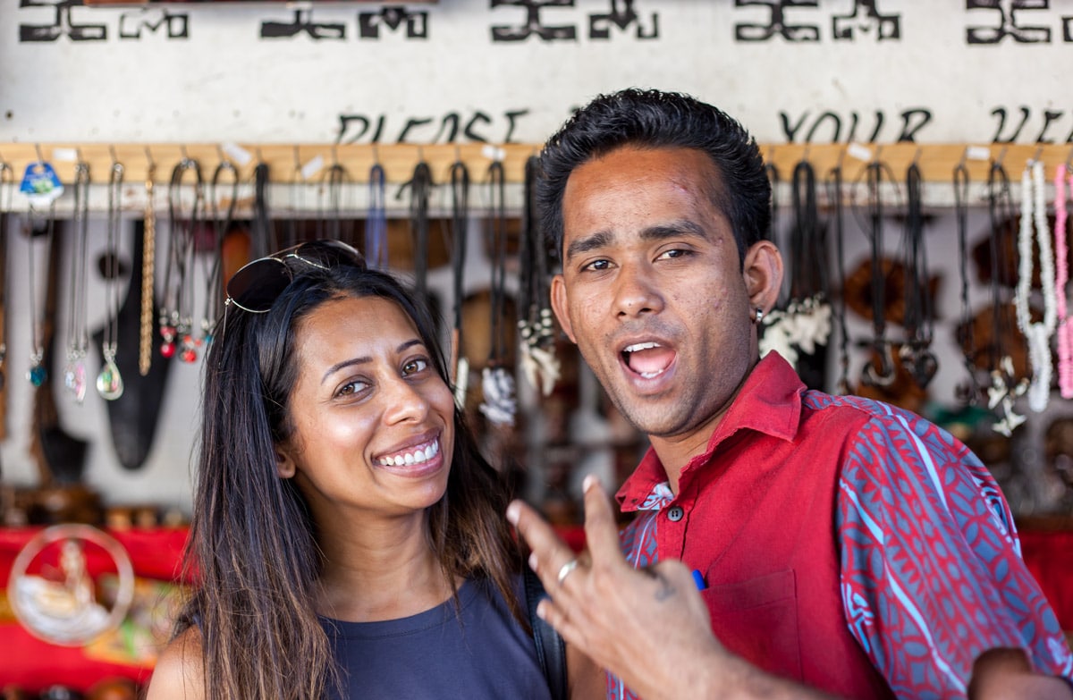 My travel buddy Simla and a local artisan in Nadi's markets